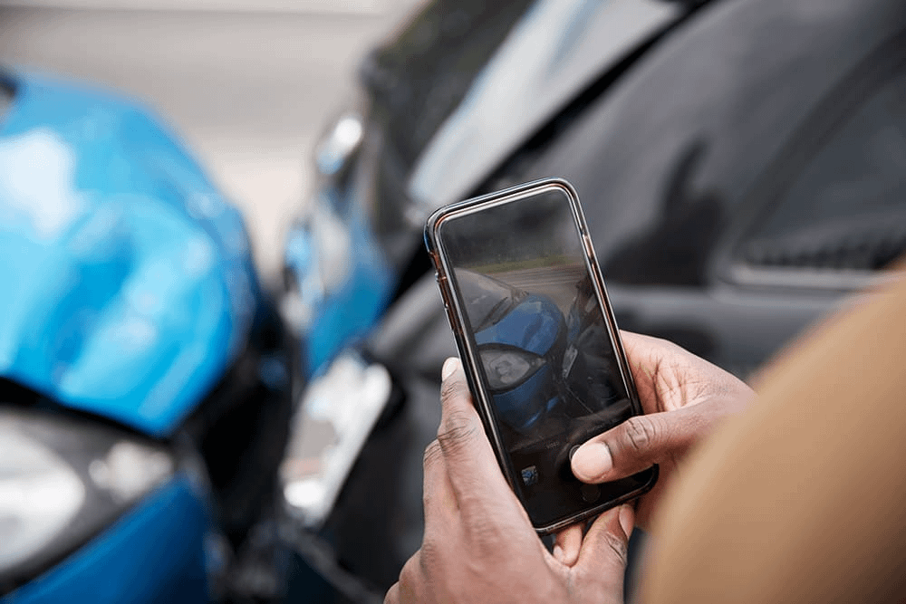 Image illustrating steps to obtain compensation after a car accident, including filing claims and gathering evidence.